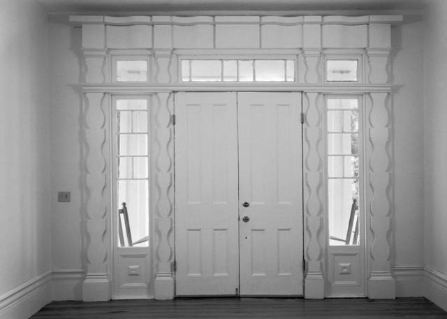 A photograph of the interior view of a front entrance.