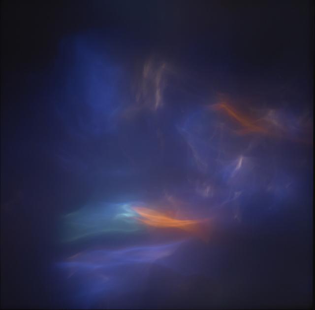 A study of light with purple, orange, green and blue tones.
