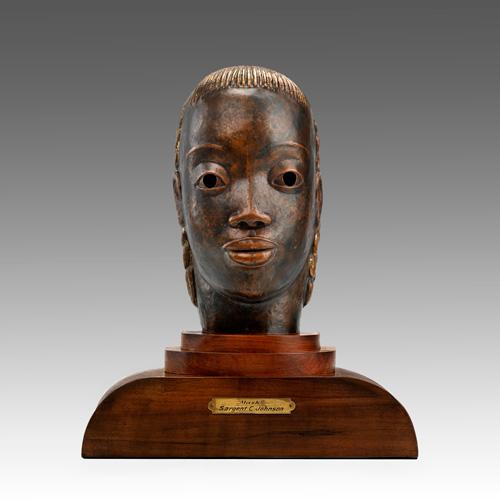 Johnson's copper and wood bust.
