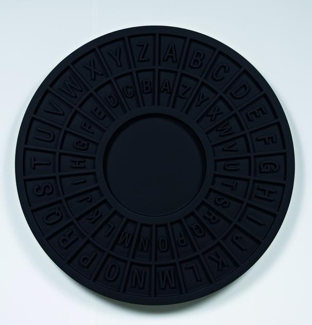 A photograph of a black circular object.