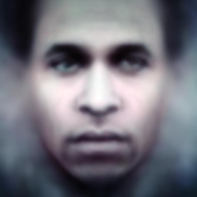 A photograph of a man's face.