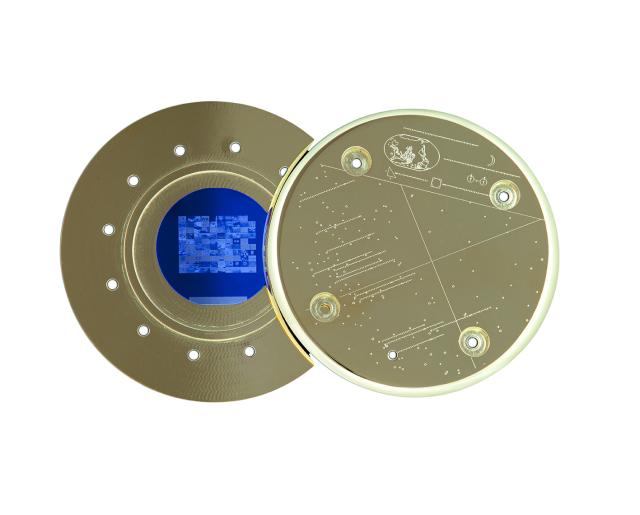 This is a photograph of a gold artifact with a blue center.