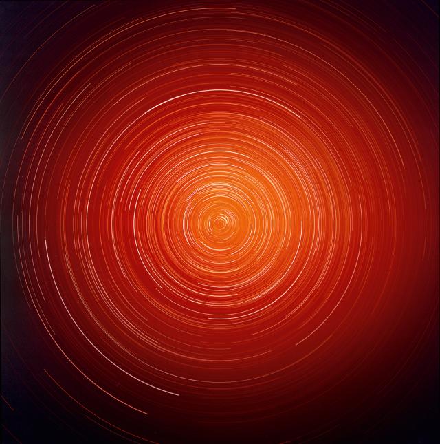 An image of a red circle with an orange interior circle.