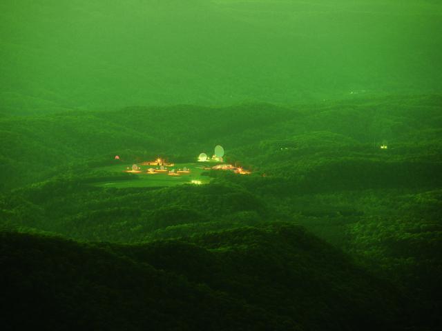 A photograph of a surveillance area at night.