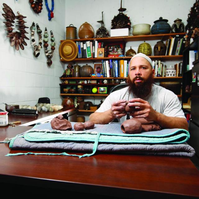 This is a picture of artist Sharif Bey in his studio.