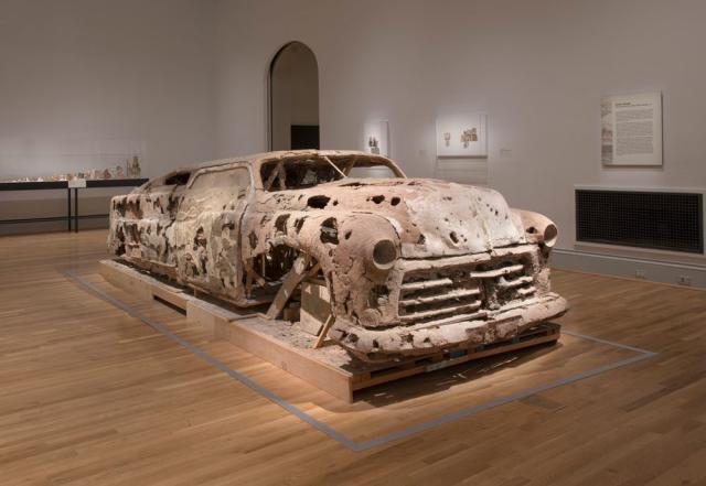 A gallery shot of an unfired clay car. 