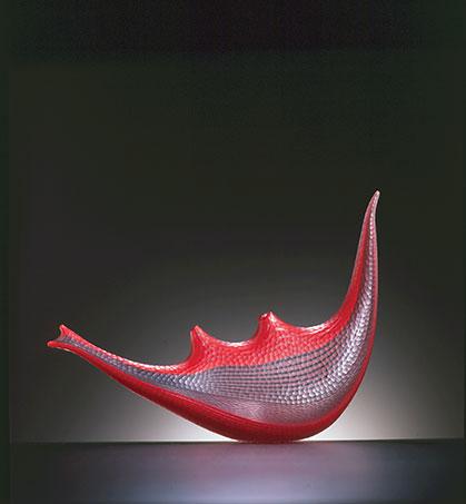 A red and clear glass object.