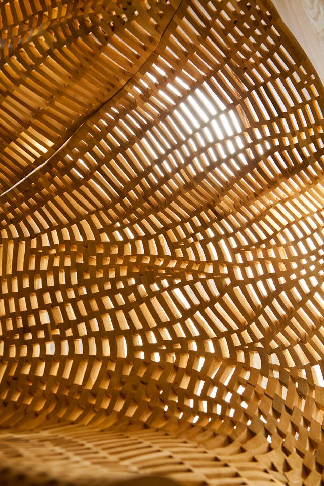 A detailed photograph of small pieces coming together to form a surface.