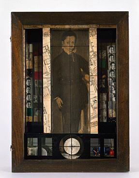 A box with a figure of a man inside.