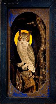 A box with an owl inside.