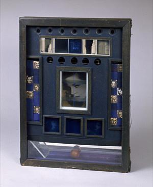 A box with a photograph of a girl inside.