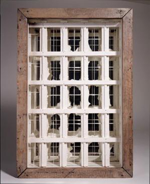 A box with white windows inside.