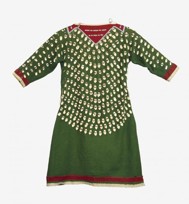 A green dress with beads and red highlights. 