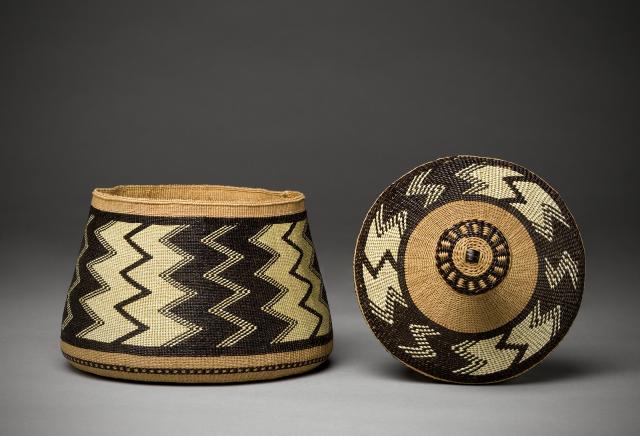 A basket made of black and white materials. 
