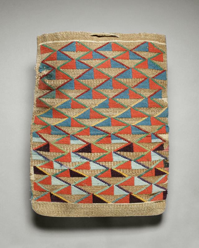 A woven bag with diagonal designs in orange, light blue, and turquoise.
