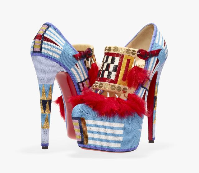 Two high heel shoes made fro beads, sequins, feathers and other items. 
