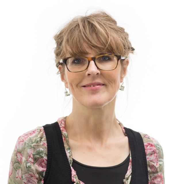 A headshot of a woman