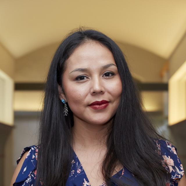 A headshot of a woman