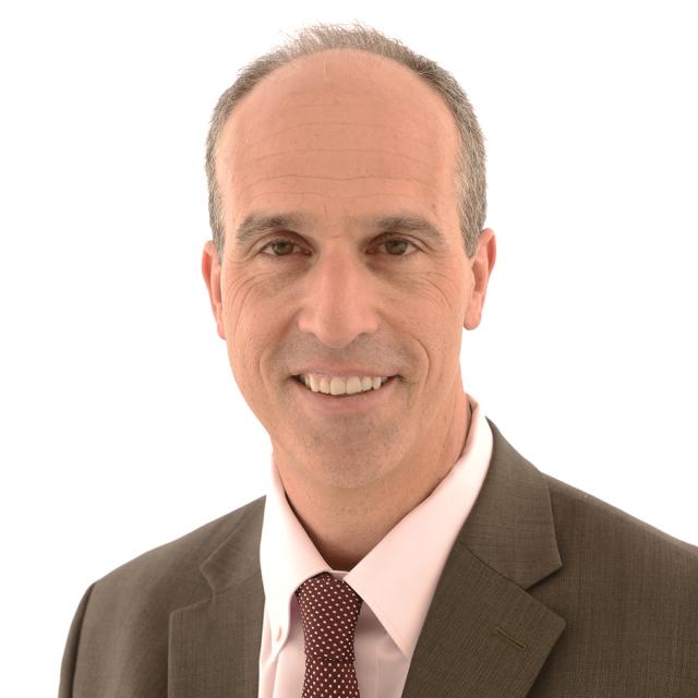 A headshot of a man