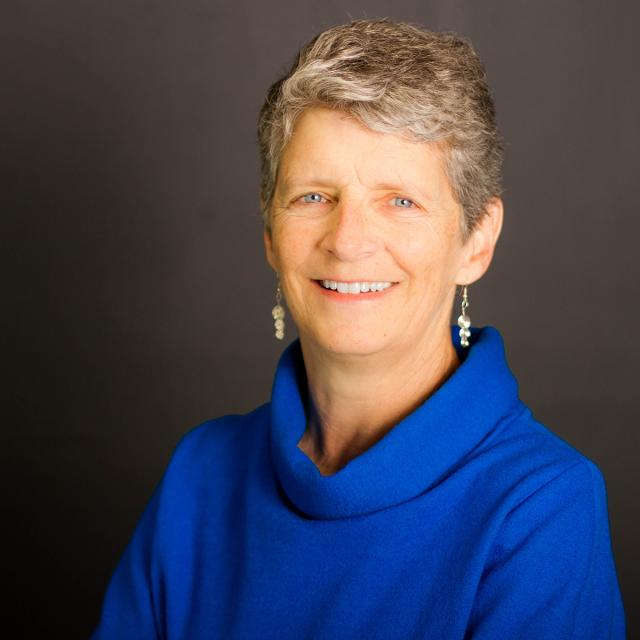 A headshot of a woman