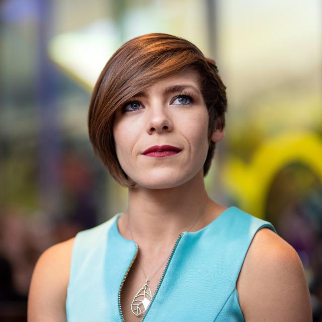 A headshot of a woman