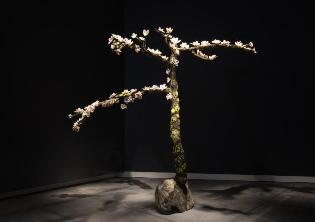 A photograph of an artwork that looks like a tree