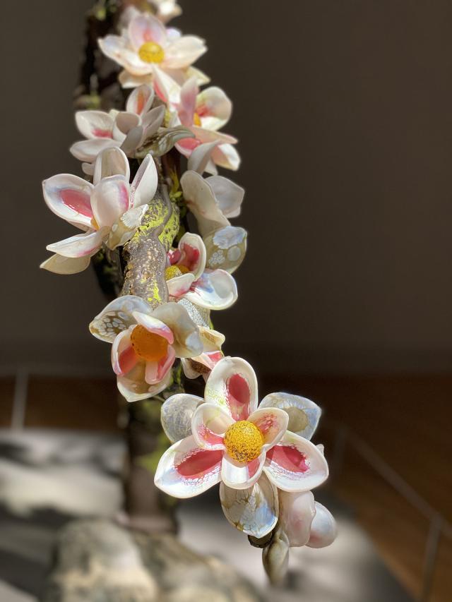 A photograph of a flower made of glass