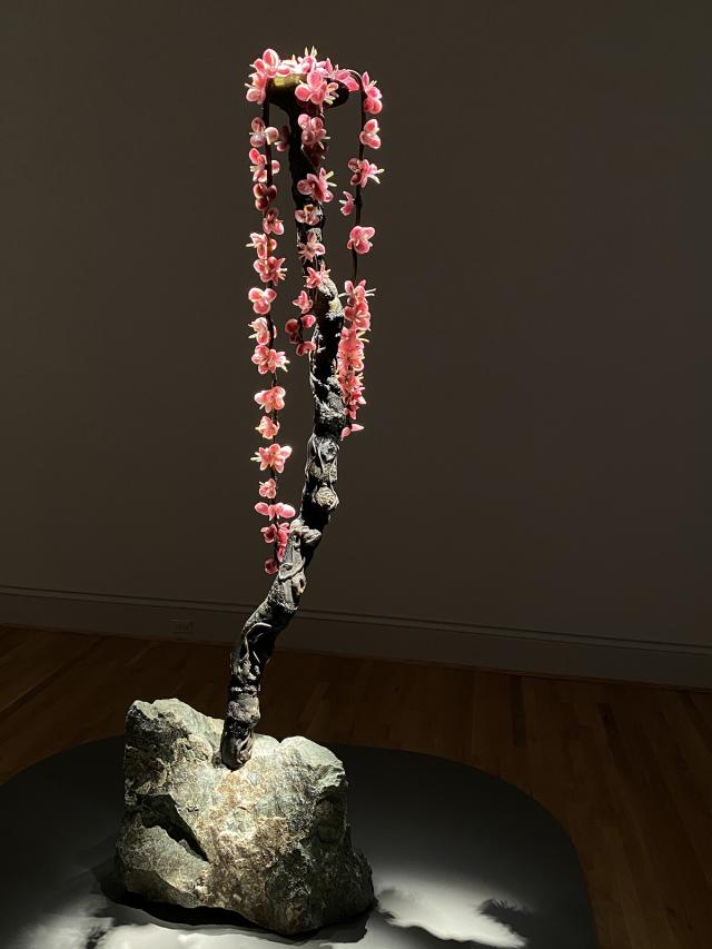 A photograph of flowers made of glass