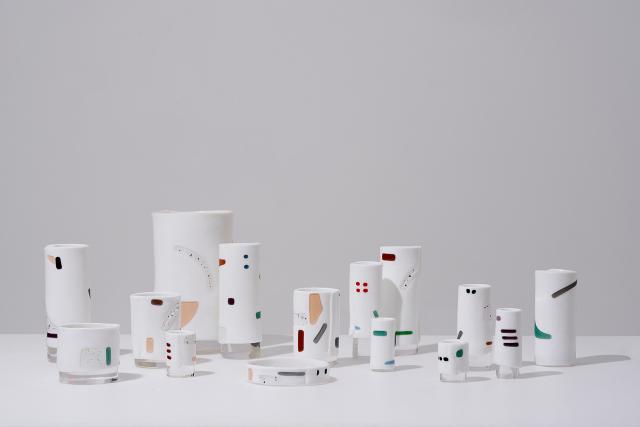 Multiple white objects displayed. 
