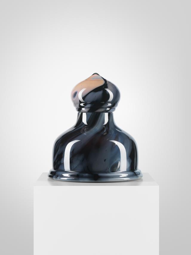 A granite artwork in the shape of a dome. 
