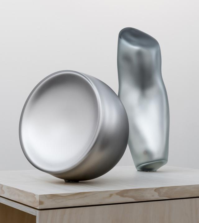 Two grey abstract objects 