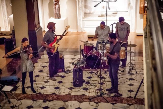 Members of the band Laughing Man perform in the Luce Foundation Center.