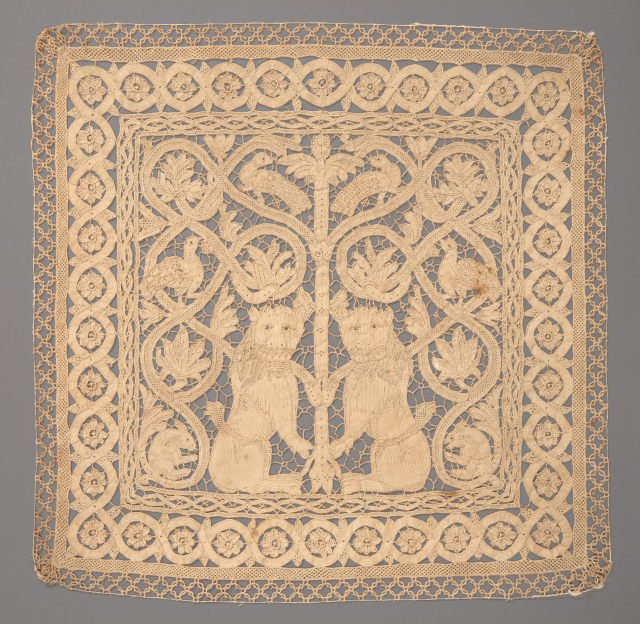 A lace panel with two lions.