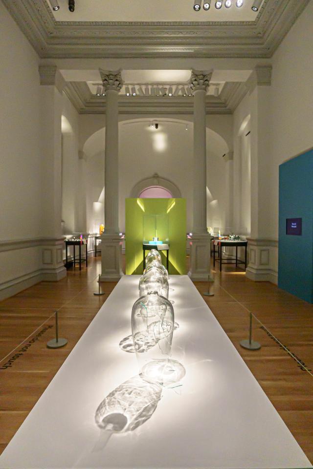 A chandelier made of glass that looks like meat.