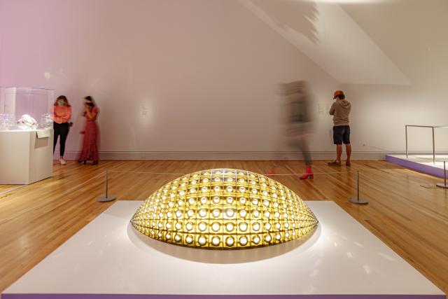 A chandelier made of glass that looks like meat.