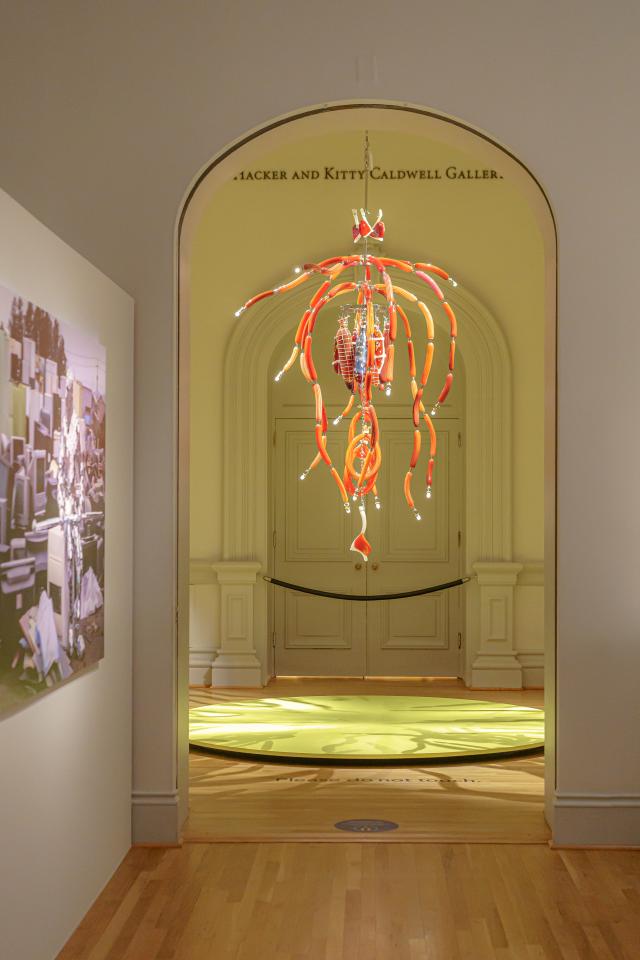 A chandelier made of glass that looks like meat.