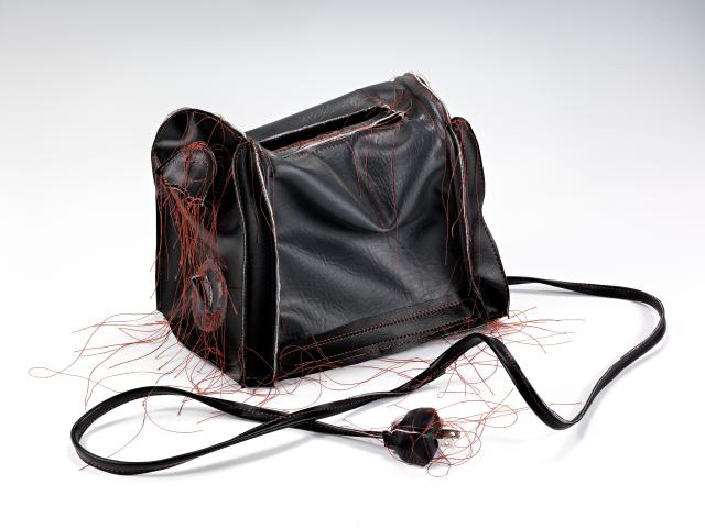 Black and Grey Crumpled Toaster