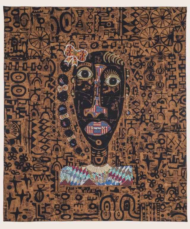 Quilt featuring the portrait of a woman