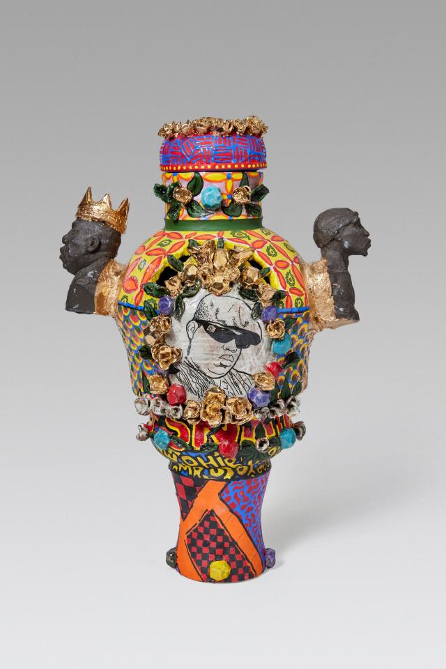 colorful vase with portrait of man