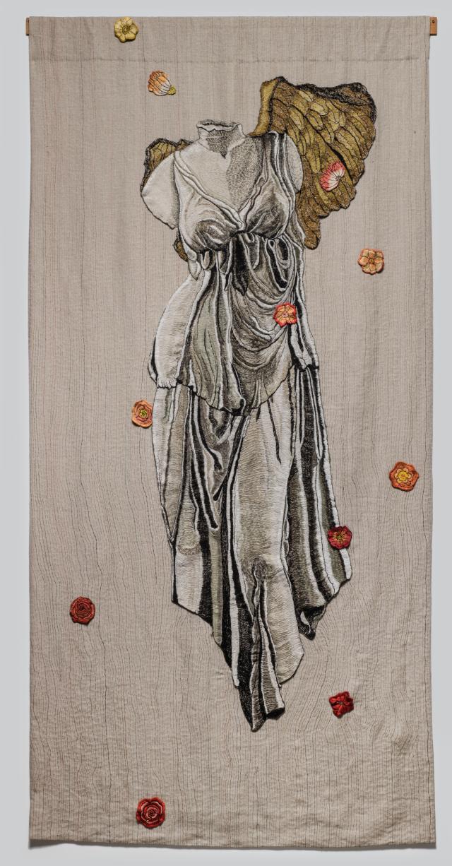 Woven fiber work with gold embellishment