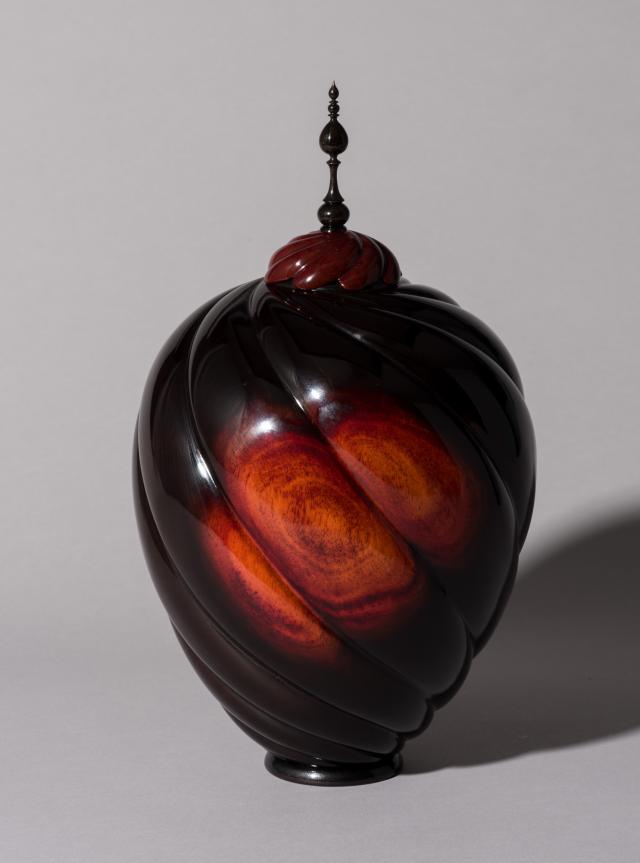 Wooden spiral urn 