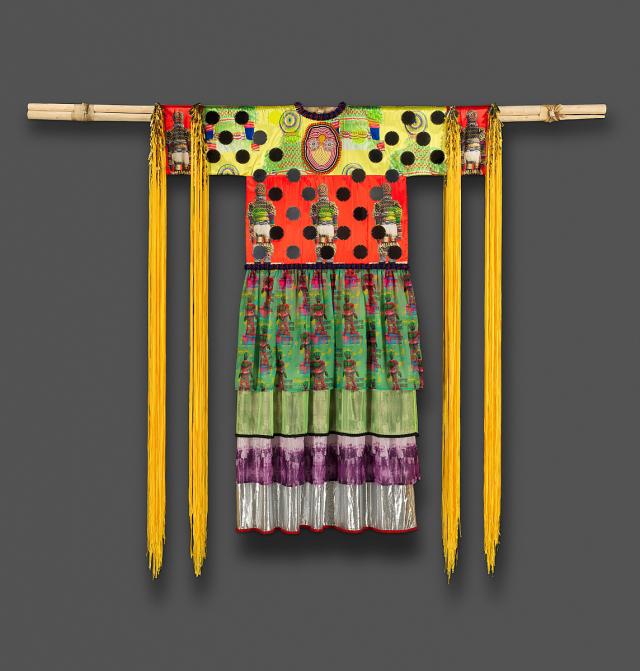 Polyester satin, printed chiffon, polyester organza, canvas, tin jingles, nylon fringe, assorted glass, plastic, and stone beads, acrylic mirrors, sheet acrylic, nylon thread, artificial sinew, tipi poles.