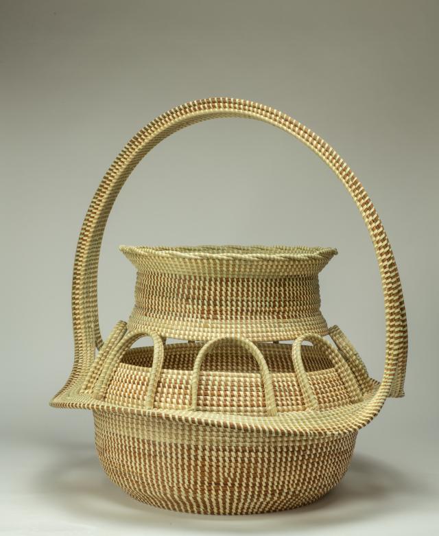 Sweetgrass basket with handle.