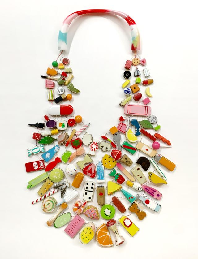 Necklace made of holly, resin, and other materials.