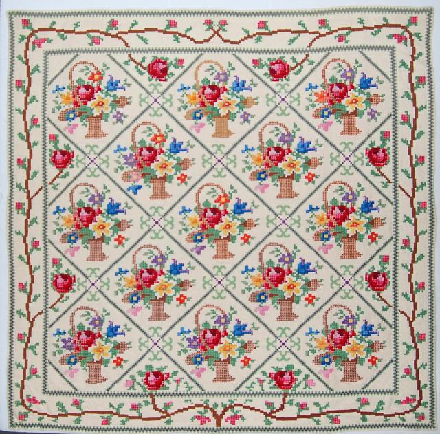 Quilt with flower motif.