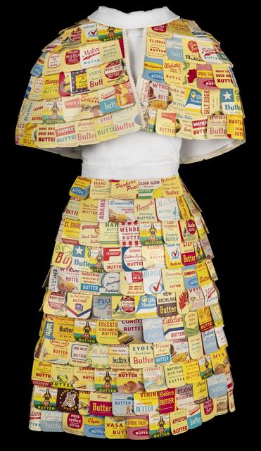 Dress made of white fabric and butter cartons.