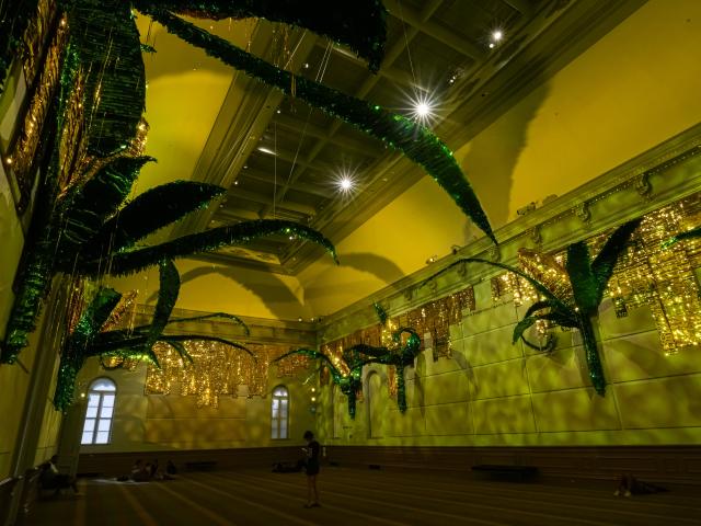 Large-scale installation of corncob piñatas.