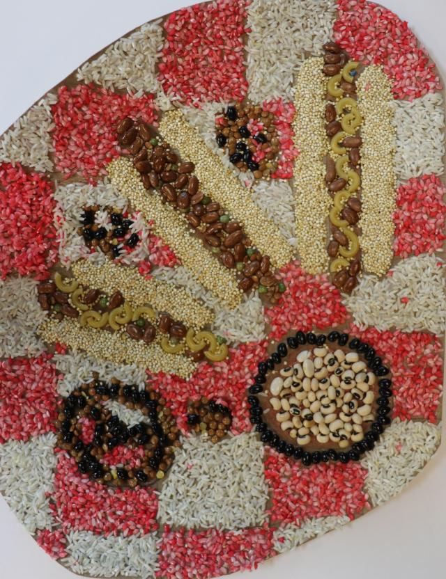 photo of artwork depecting hot dog but made of other foods