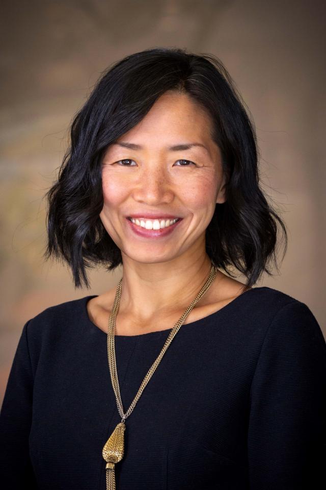 color photo of Maggie M. Cao