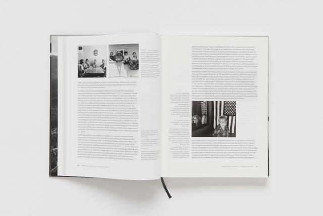 An opened book of a photography catalogue.